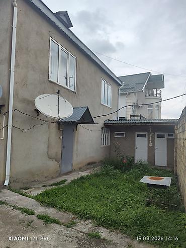 digah ev: Qusar şəhərində, Xıdır restoranı ilə üzbəüz yerləşən iki mərtəbəli ev — 2