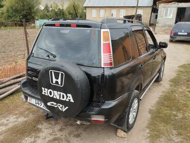 противотуманные фары: Honda CR‑V (1‑е поколение), черный кроссовер 5‑дверный. Основные