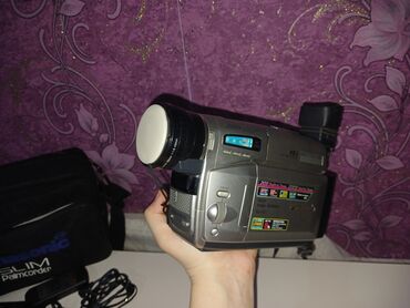 videokamera stativ: Panasonic camera islekdi, teze kimidir. Qiymet: 150 azn