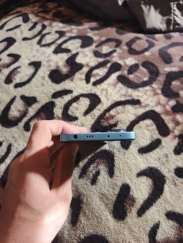 Redmi: Xiaomi Redmi Note 12 (mavi rəng) - 6,67" AMOLED displey, mərkəzdə — 9