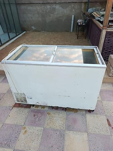 qapi zvanok: Şüşəli dondurucu — 1