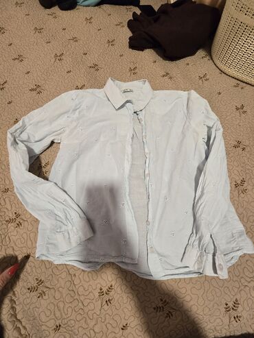 Qadın şalvarları: Bu dəstə müxtəlif üslublu dörd qadın şalvarı və bir qara ətək — 36