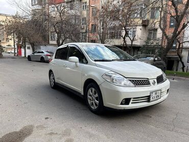 taksi nişanı: Nissan Tiida: 1.6 l | 2008 il Hetçbek