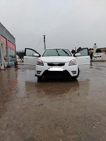 Kia: Kia Rio: 1.4 l | 2010 il Sedan — 7