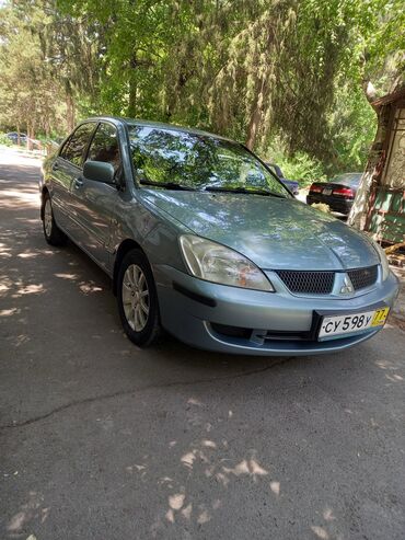 зимнее: Mitsubishi Lancer: 2006 г., 1.6 л, Механика, Бензин, Седан