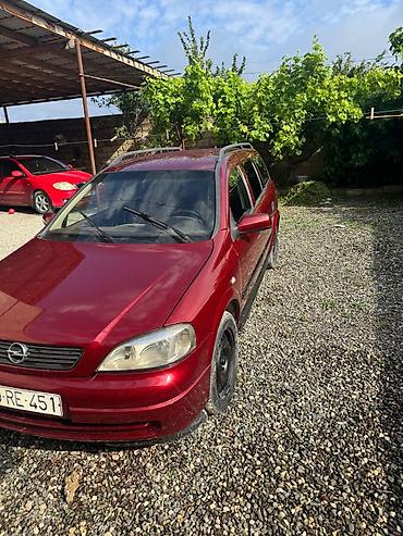 opel astra benzin: Opel Astra Caravan (Universal), qırmızı gövdə yalnız kredetlə — 5