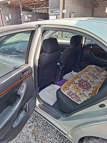 рул: Toyota Avensis: 2004 г., 2 л, Автомат, Седан — 9