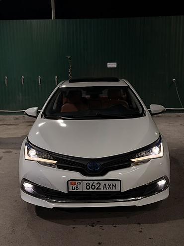 Toyota Corolla: 2020 г., 1.8 л, Автомат, Гибрид, Седан