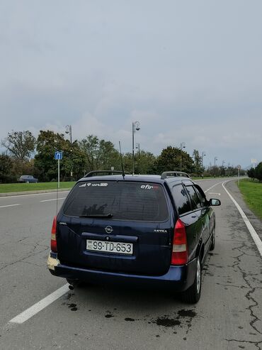 фольксваген поло 1 4: Opel Astra Universal (stansiya vaqonu) - Kuzov: universal, tünd mavi