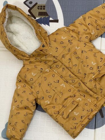 детская кожанная куртка: Новая детская куртка на 18 мес.
Материал: парка