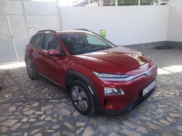 кованные диски: Электрический кроссовер Hyundai Kona Electric красного цвета. Модель