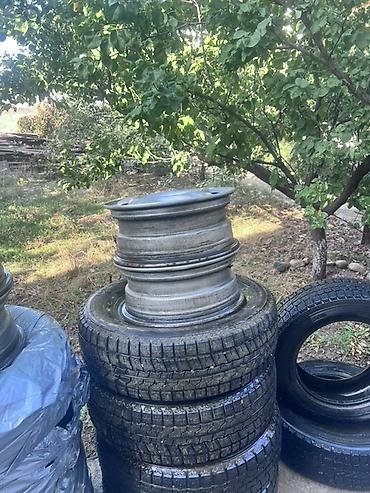 Шины: Комплект зимних шин Goodyear ICENAVI размером 205/70 R15 96T. На фото — 9
