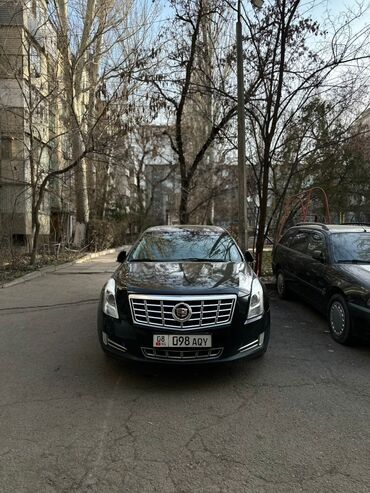 сколько стоит электрический мотоцикл: Cadillac SRX: 2013 г., 2 л, Автомат, Бензин, Седан