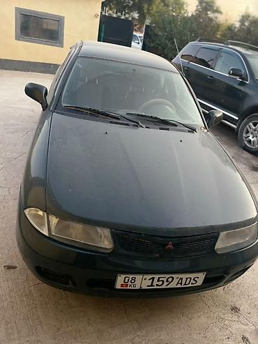 панель камри 35: Mitsubishi Carisma: 1997 г., 1.8 л, Автомат, Бензин, Седан — 8
