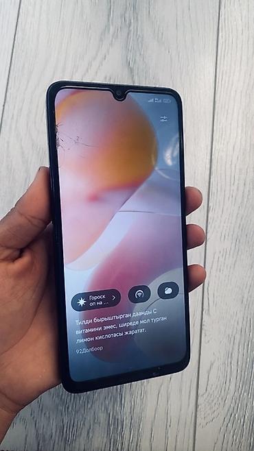 Мобильные телефоны: Смартфон Redmi 13C (модель на экране устройства), цвет черный — 2