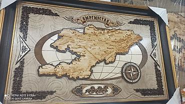 кыргызский орнамент: Эмблема Кыргызстана в рамке, выполненная в ярких цветах, представляет — 8
