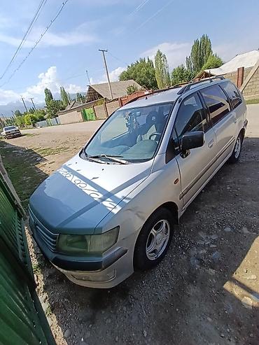 четырка цена: Mitsubishi Chariot: 1999 г., 2.4 л, Механика, Бензин, Универсал — 1