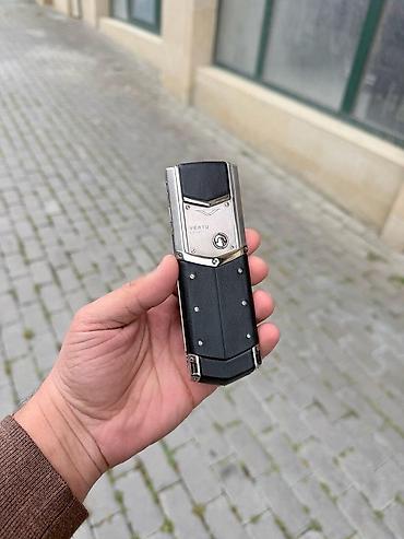 vertu phone: Vertu 4 GB, rəng - Gümüşü, Düyməli — 9