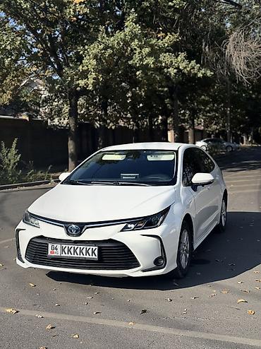 corolla 2016: Toyota Corolla: 2021 г., 1.8 л, Вариатор, Гибрид, Седан — 2