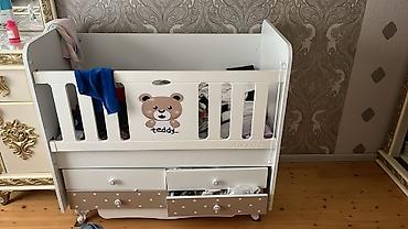Beşiklər: Uşaq beşiyi – “Teddy” dizaynlı, ağ rəngdə. - Material: ağ rəngli — 1