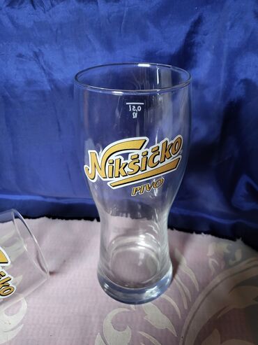 Čaše: Case nove Niksicko pivo. Nove case. sve na njima odsjaj od svetla na lalafo.rs — 8 Čaše: Case nove Niksicko pivo. Nove case. sve na njima odsjaj od svetla — 8