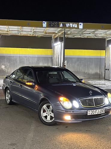 cls 63 amg: Mercedes-Benz E 200: 2 l | 2004 il Sedan — 1