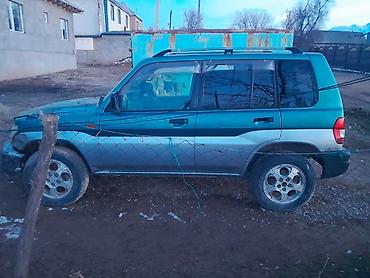 4 4: Mitsubishi Pajero iO: 1998 г., Бензин, Внедорожник — 2