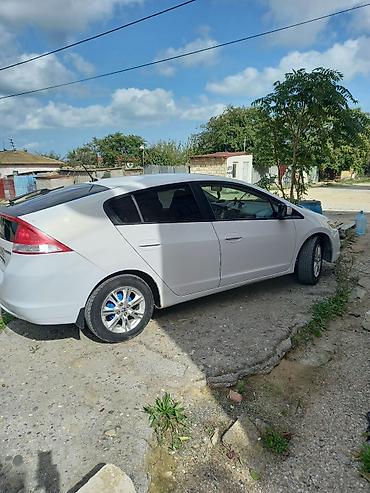 qara disk: Honda Insight hibrid hetçbek - Kuzov: hetçbek, ağ rəng - Yanacaq — 5