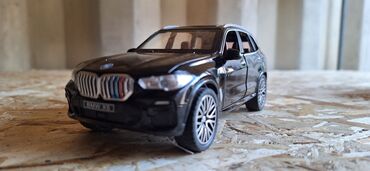Модели автомобилей: BMW X5. Сувенир, игрушка, можно поставить на панель машину