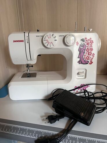 фотограф без опыта: Тигүүчү машина Janome, Автомат