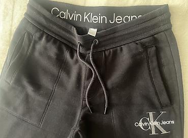 jogger şalvar: Calvin Klein Jeans kişi jogger şalvarı - Rəng: qara - Model: CK Jeans — 1