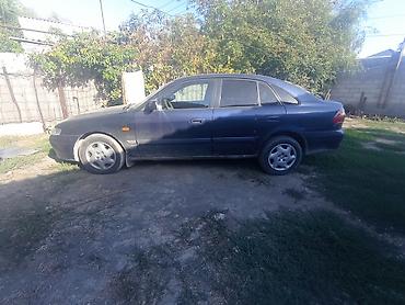 диски mazda: Mazda 323: 2000 г., 0.2 л, Автомат, Бензин, Седан — 1