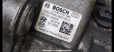фреон авто: Топливный насос Bosch с номером детали и дополнительным обозначением — 4