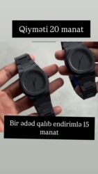 miu miu eynek: Minimalist dizaynlı qara qol saatı - Tam qara, mat korpus və metal