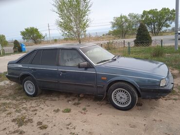 Транспорт: Mazda 626: 1987 г., 2 л, Механика, Бензин, Хэтчбэк