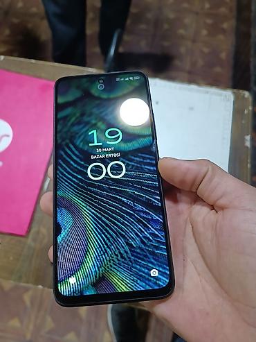 redmi note 13 256 gb: Xiaomi 12, 256 GB, rəng - Qara, 
 İki sim kartlı, Face ID, Sənədlərlə — 2