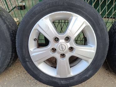 Gume i felne: Alu felne Opel Meriva 15 raspon rupa 5X110mm,centralna rupa — 10