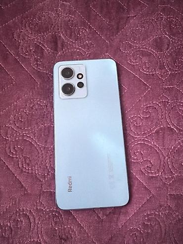 iphone x teze: Redmi smartfon. Açıq mavi rəngdə korpusa malikdir və arxa hissədə iri — 1