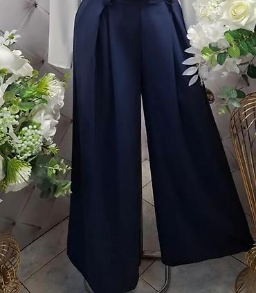 bluze elegantne: Elegantne široke pantalone – tamnoplava boja - Kroj: široke nogavice — 1