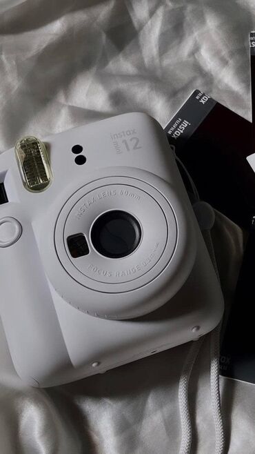 Фотоаппараты: Instax 12 mini,новый в отличном состоянии(чехол+альбом+1 картридж в