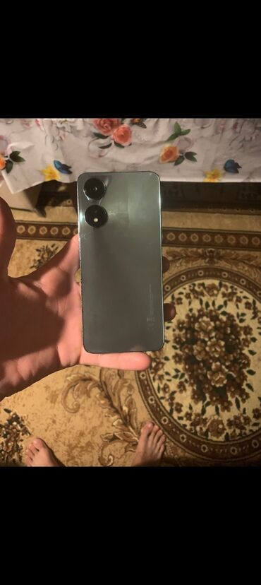 telfon qablari: Smartfon Arxasında yüngül çat va başqa heç bir problem yoxdur - Arxa