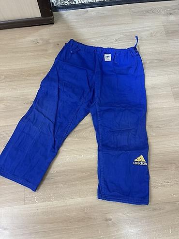 пояса дзюдо: Синее кимоно для дзюдо Adidas Champion + штаны Вверх лицензионный - — 1