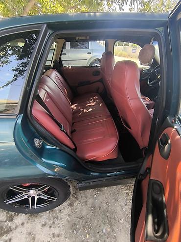 Opel: Opel Astra: 1.6 l | 1997 il Sedan — 4