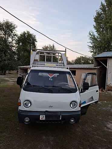 Транспорт: Hyundai Porter — малотоннажный бортовой самосвал Основное: - — 1