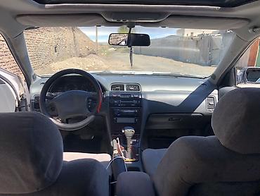 Передние фары: Передняя левая фара Nissan — 1