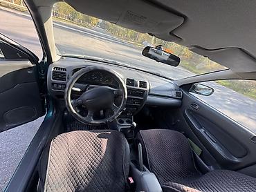 плуг для мтз трактора: Mazda 323: 1997 г., Механика, Бензин, Седан — 9