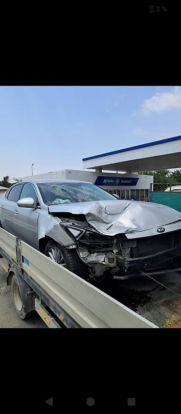 св: KIA Cadenza (K7), серебристый седан бизнес‑класс — 2
