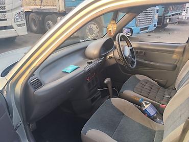 5 vz: Nissan Micra: 1995 г., 1.3 л, Автомат, Бензин, Хэтчбэк — 3