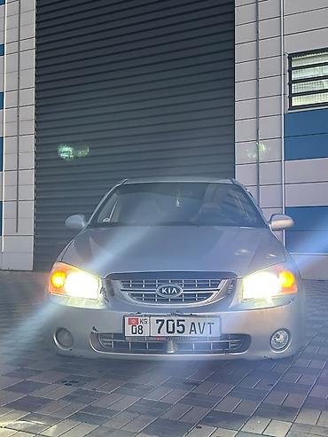 385 55: Продаётся седан Kia Cerato серебристого цвета. Автомобиль 4-дверный — 3