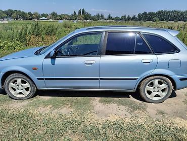 Транспорт: Mazda 323: 2000 г., 1.5 л, Механика, Бензин, Универсал — 3